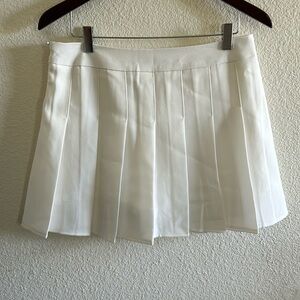 White mini tennis skirt